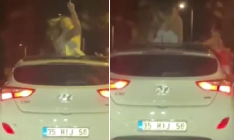 Böyle eğlence olmaz olsun! Seyir halindeki araçta yaptıklarına bakın ve Merak Edilenler