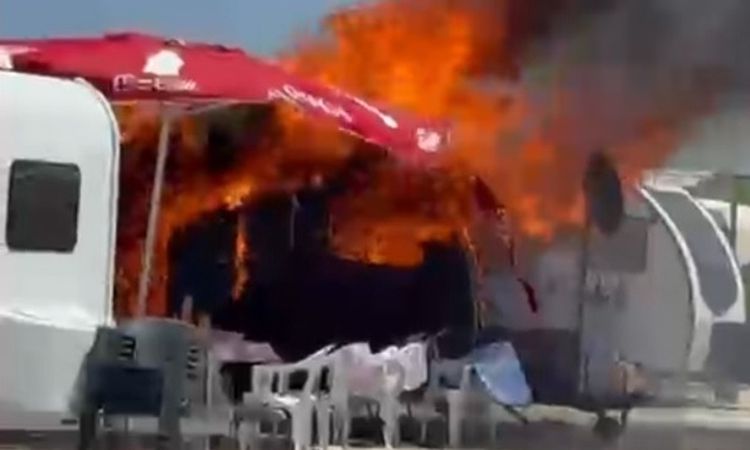 Parked caravan surrendered to flames - News